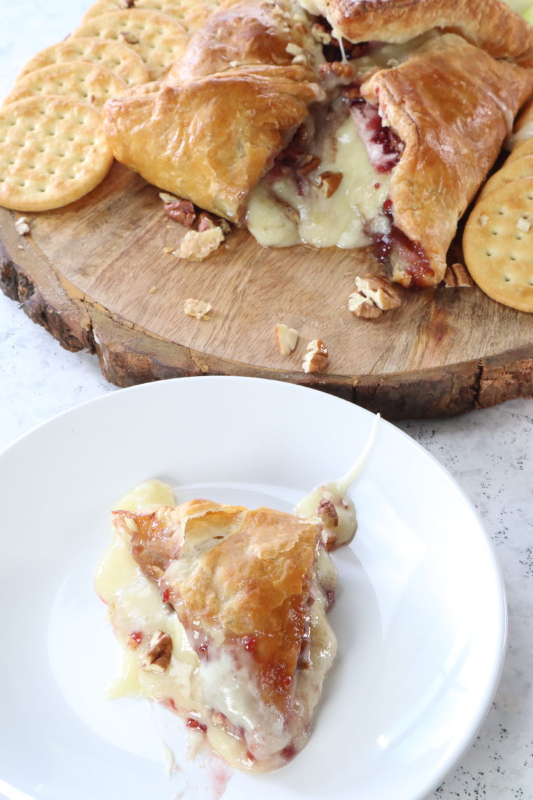 Can I bake Brie in the air fryer without a crust?
Yes, you can bake Brie in the air fryer without wrapping it in a crust. Just place the cheese directly in the air fryer basket. Monitor closely to avoid over-melting.
How do I prevent the Brie from leaking in the air fryer?
To prevent leakage, ensure the outer rind of the Brie is intact. If using puff pastry, seal it well around the Brie. Avoid overcooking, as the cheese can burst if heated for too long.
What temperature should I set my air fryer to for baking Brie?
Typically, you should set your air fryer to around 350°F (175°C) for baking Brie. However, temperatures can vary slightly based on the air fryer model.
How long does it take to bake Brie in an air fryer?
Baking Brie in an air fryer usually takes about 10-15 minutes if wrapped in pastry and around 5-10 minutes if it's unwrapped. Always monitor the cheese to prevent overcooking.
What can I serve with Baked Brie?
Baked Brie pairs well with crackers, sliced baguette, apple slices, grapes, nuts, and honey for drizzling.
Can I add toppings to my Baked Brie?
Absolutely! Popular toppings include fruit preserves (raspberry preserves or apricot preserves are the most popular), nuts, honey, fresh herbs, caramelized onions, or a drizzle of balsamic glaze.
Do I need to flip the Brie while it’s cooking in the air fryer?
It's not necessary to flip the Brie. It should be baked evenly in the air fryer without turning.
Can I use other types of cheese for this recipe?
Brie is ideal for this recipe due to its creamy texture when melted. However, you can experiment with soft cheeses similar to Camembert.
How do I know when the Baked Brie is done?
The Brie is done when it feels soft, and the pastry (if used) is golden brown. Be careful not to overcook, as the cheese may ooze out.
Is Baked Brie suitable for people with lactose intolerance?
Brie is a dairy product, so it's unsuitable for those with lactose intolerance or dairy allergies.
Can I reheat leftover Baked Brie?
While best enjoyed fresh, you can reheat leftovers in the air fryer for a few minutes. Keep in mind that the texture might change slightly upon reheating.
Can I bake a frozen Brie in the air fryer?
It's recommended to thaw frozen Brie before air frying for even cooking and the best texture.