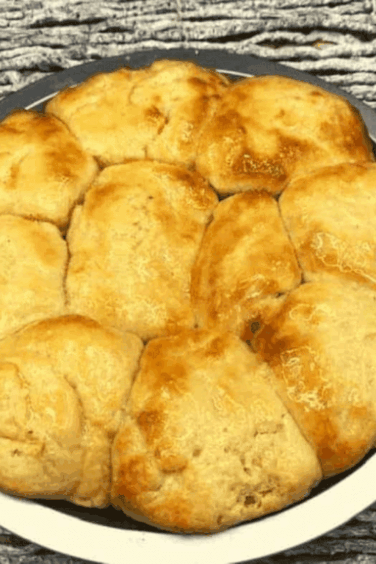 golden brown Sister Schubert's Parker House rolls in a serving basket
