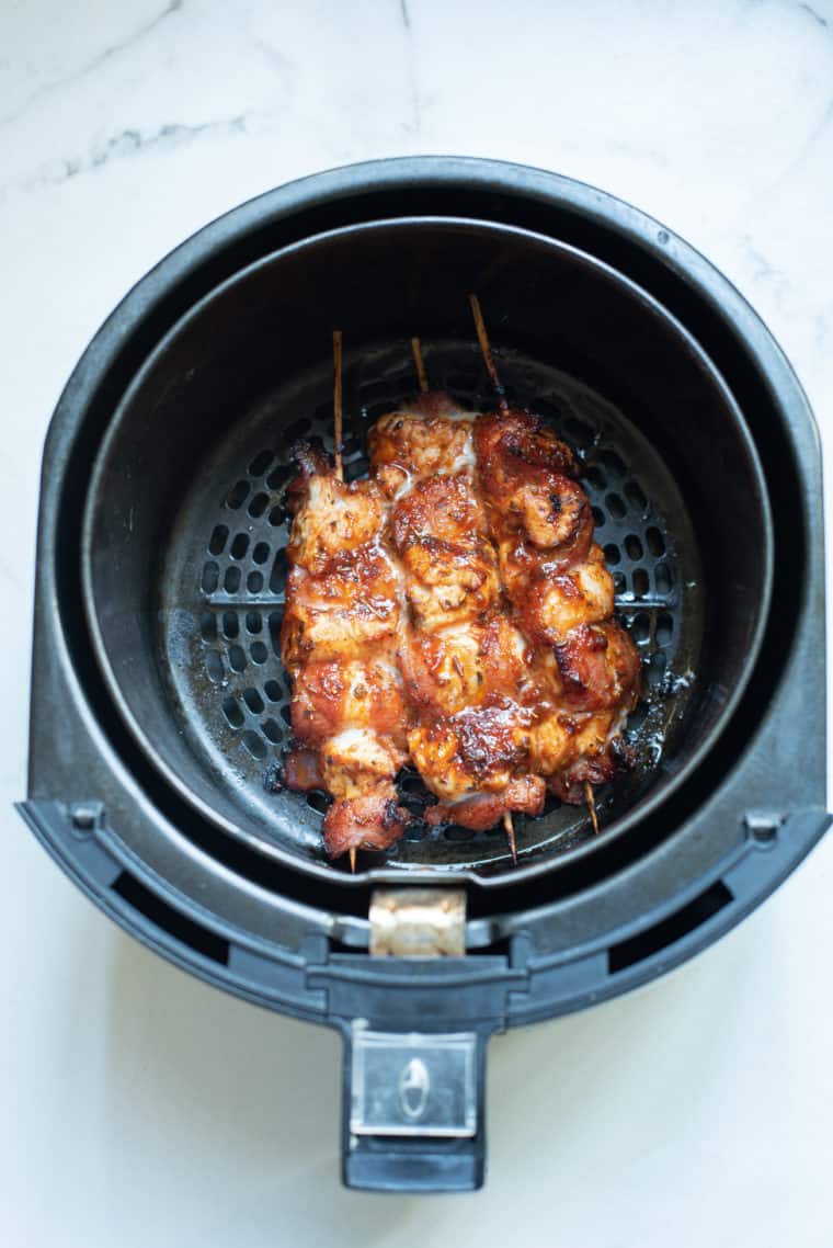 Air Fryer Bacon Wrapped Chicken Bites: Savory chicken wrapped in crispy bacon, cooked to golden perfection in the air fryer.
