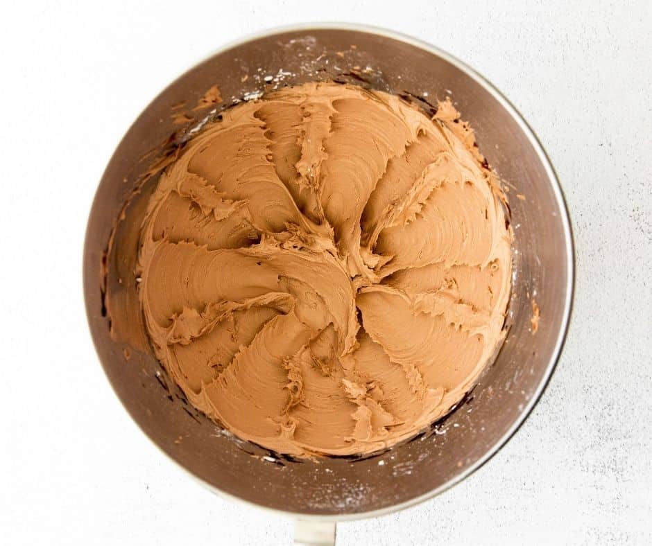 Prepare the frosting in a large mixing bowl.