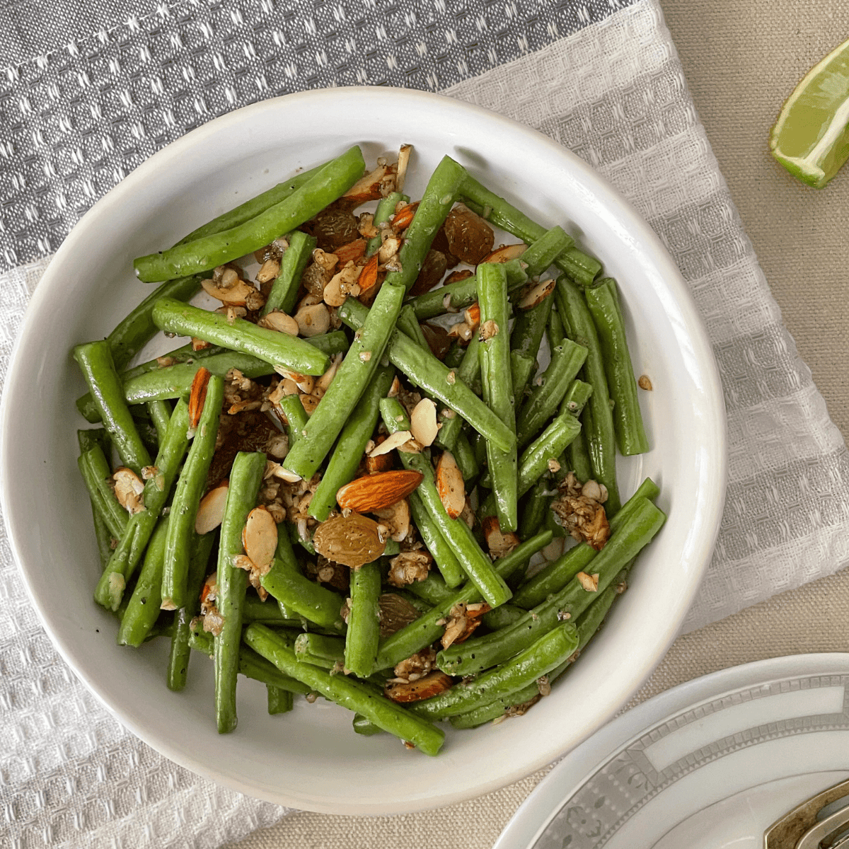 Golden and crispy air-fried frozen green beans served as a healthy side dish.