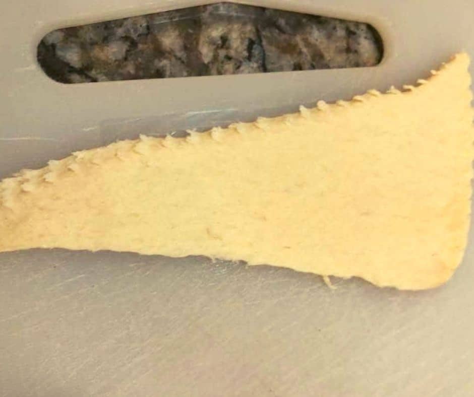 Roll out crescent dough on flat surface