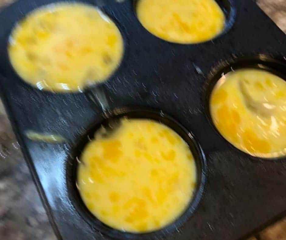 Eggs and ingredients in bowl, Air Fryer Mini Cheese Frittatas