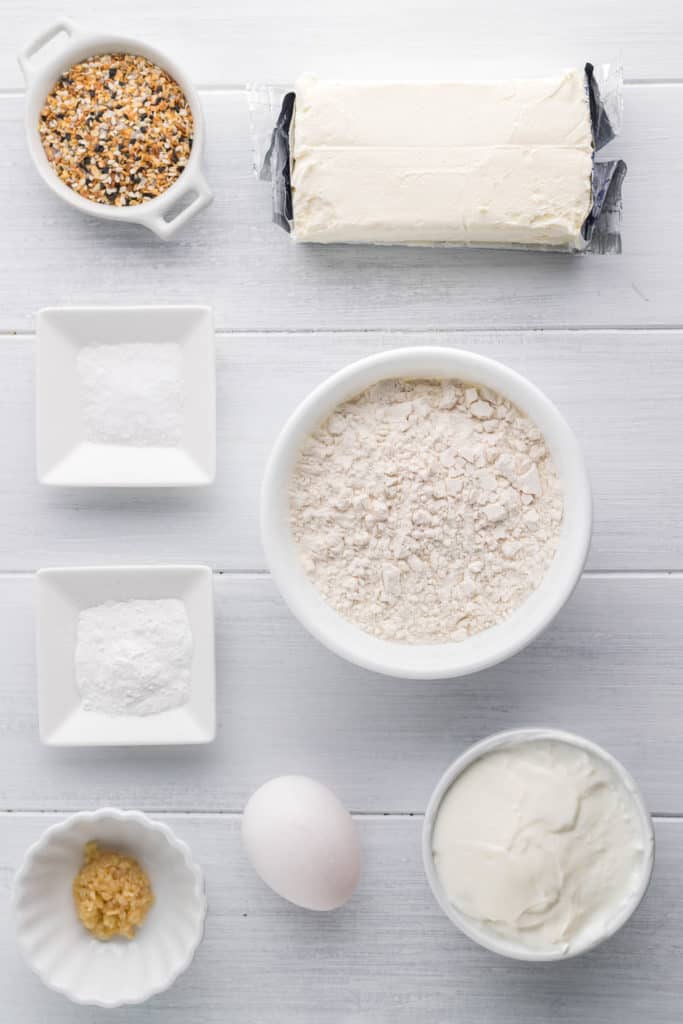 Key components for Dunkin' Bagel Bites: self-rising flour, Greek yogurt, cream cheese, and seasonings.