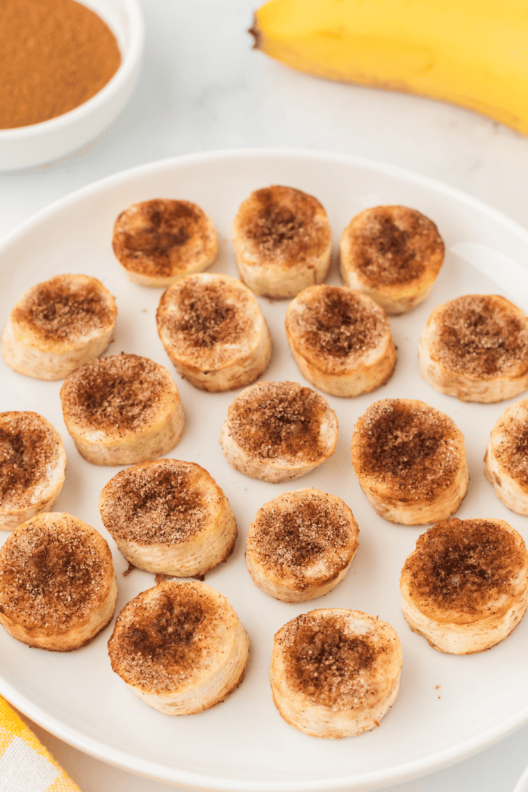 Crispy, golden Air Fryer Fried Bananas served as a sweet dessert.