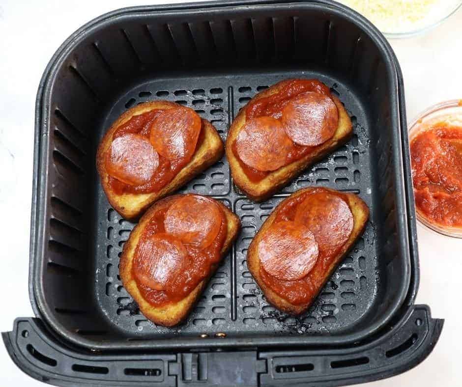 Pepperoni Pizza With Sauce in Air Fryer Basket