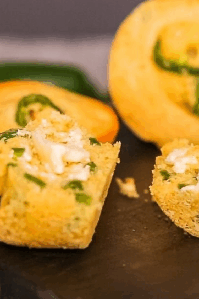Freshly baked air fryer jalapeño corn muffins with golden tops