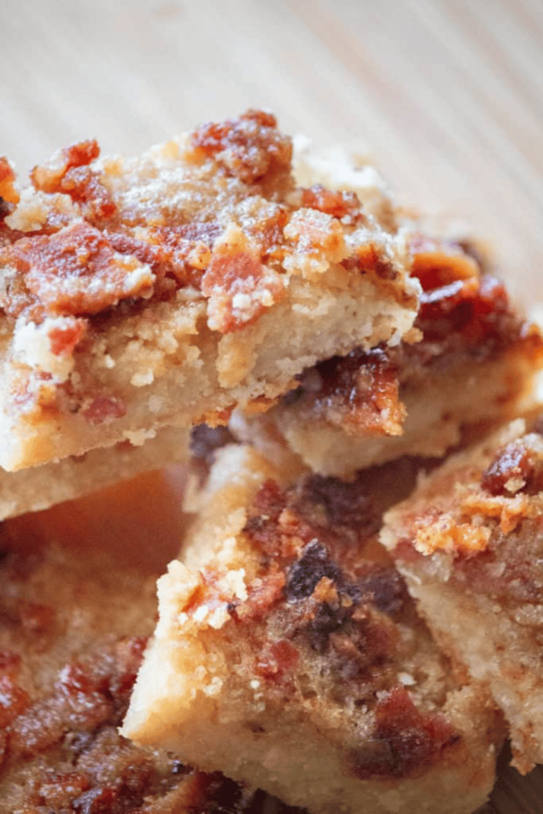 Crispy sugar-free maple glazed bacon pieces in an air fryer basket, ready to serve