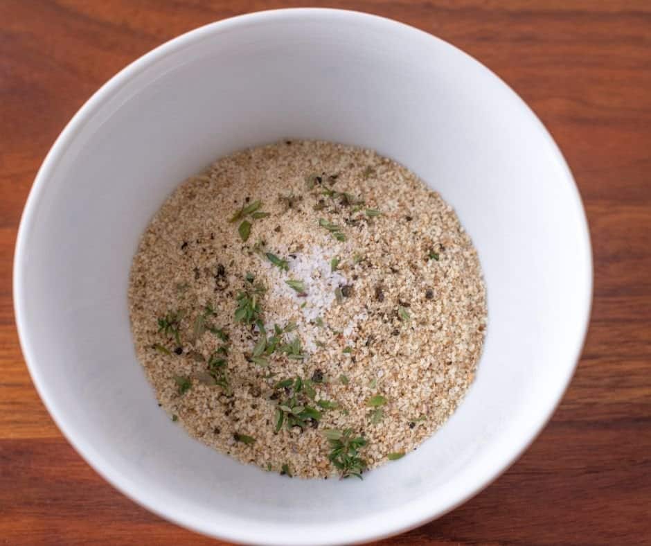 Breadcrumbs-in-bowl add seasonings