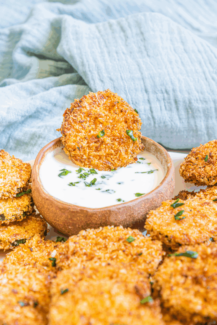 Golden, crispy zucchini crisps coated in Parmesan and cooked in the air fryer