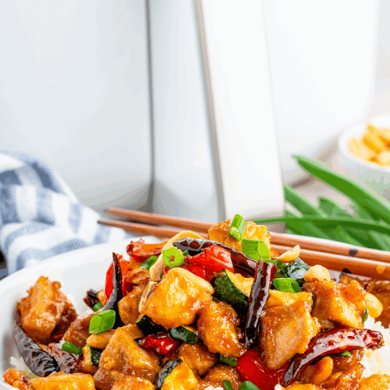 Air fryer Panda Express Kung Pao Chicken with peppers and peanuts.