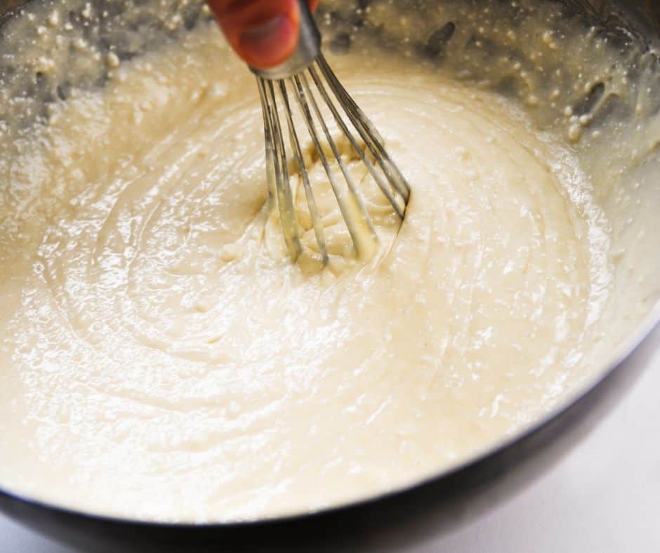 Mix the banana muffin mix, flour, butter, and sour cream in a large bowl until well combined.