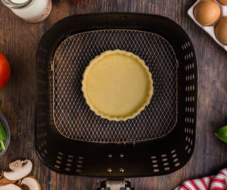 Blind Bake the crust in the air fryer basket.