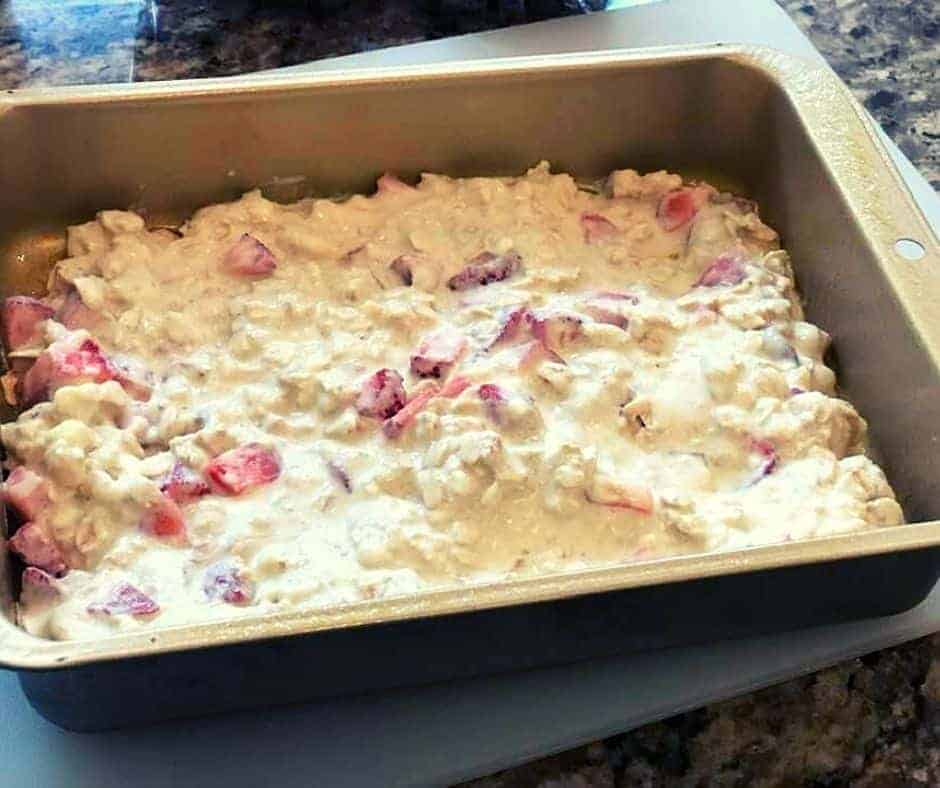 Spread Strawberries & Cream oatmeal in a baking pan