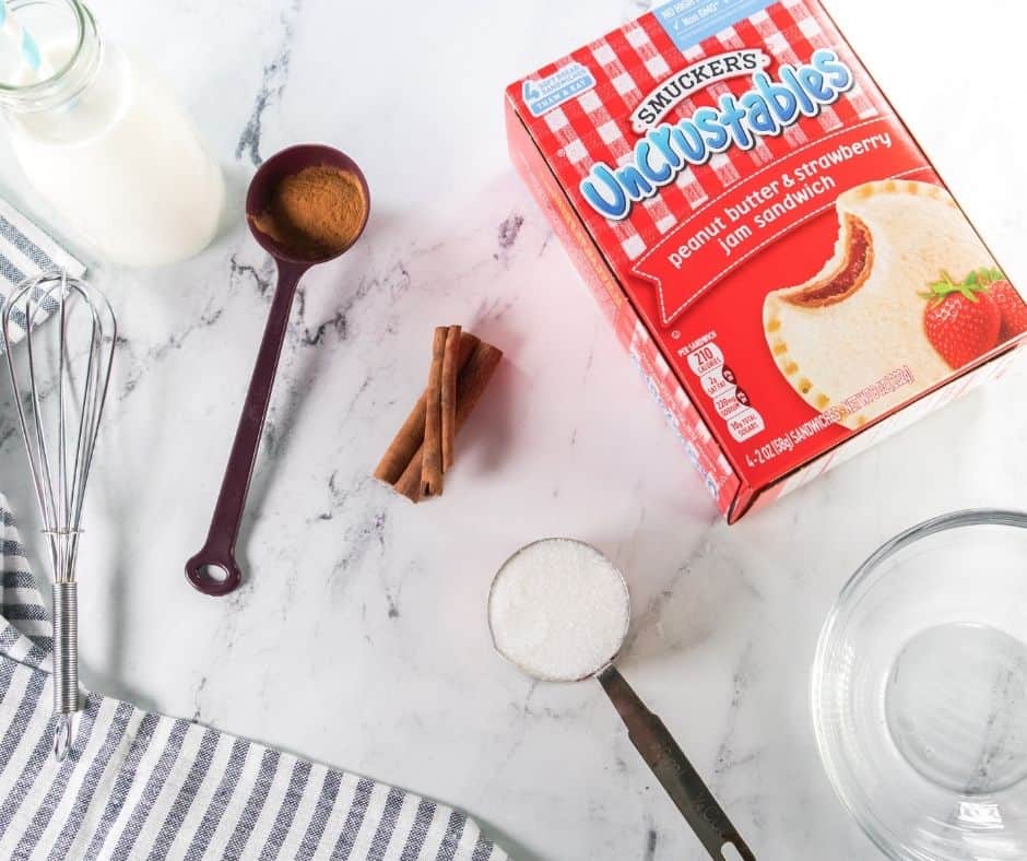 Ingredients needed for making Air Fryer Uncrustable Donuts on kitchen table.