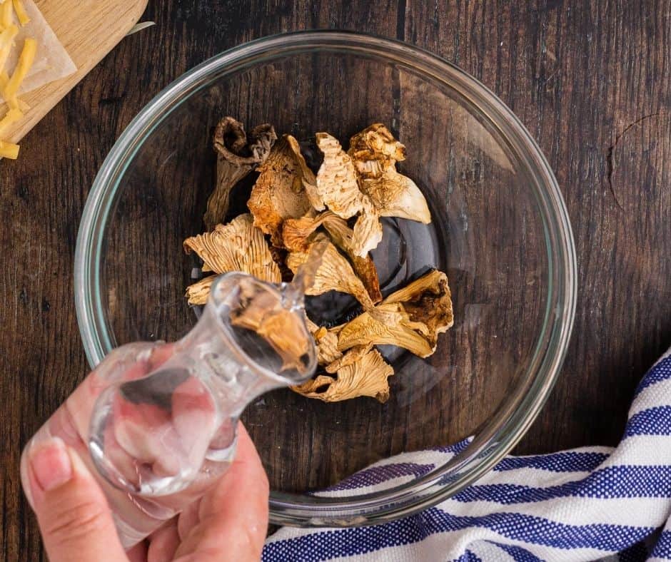 Soak the mushrooms with water to rehydrate them.