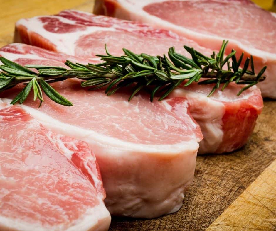 Ingredients Needed For Instant Pot Pork Chops in Mushroom Gravy on cutting board.