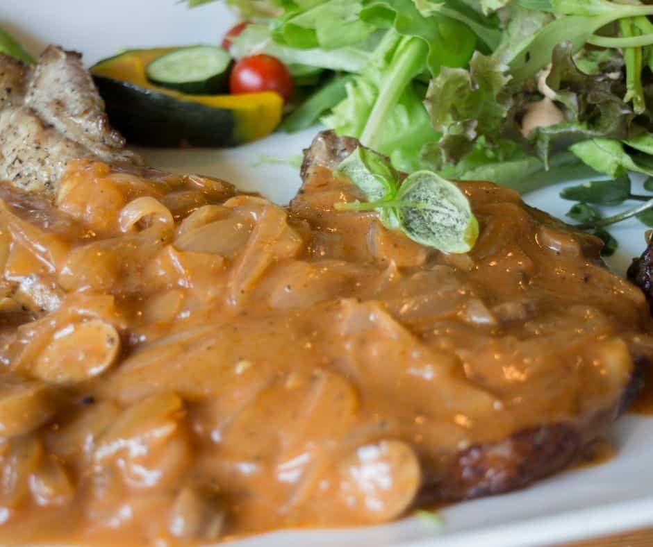 Juicy pork chops smothered in creamy mushroom gravy, cooked in an Instant Pot.