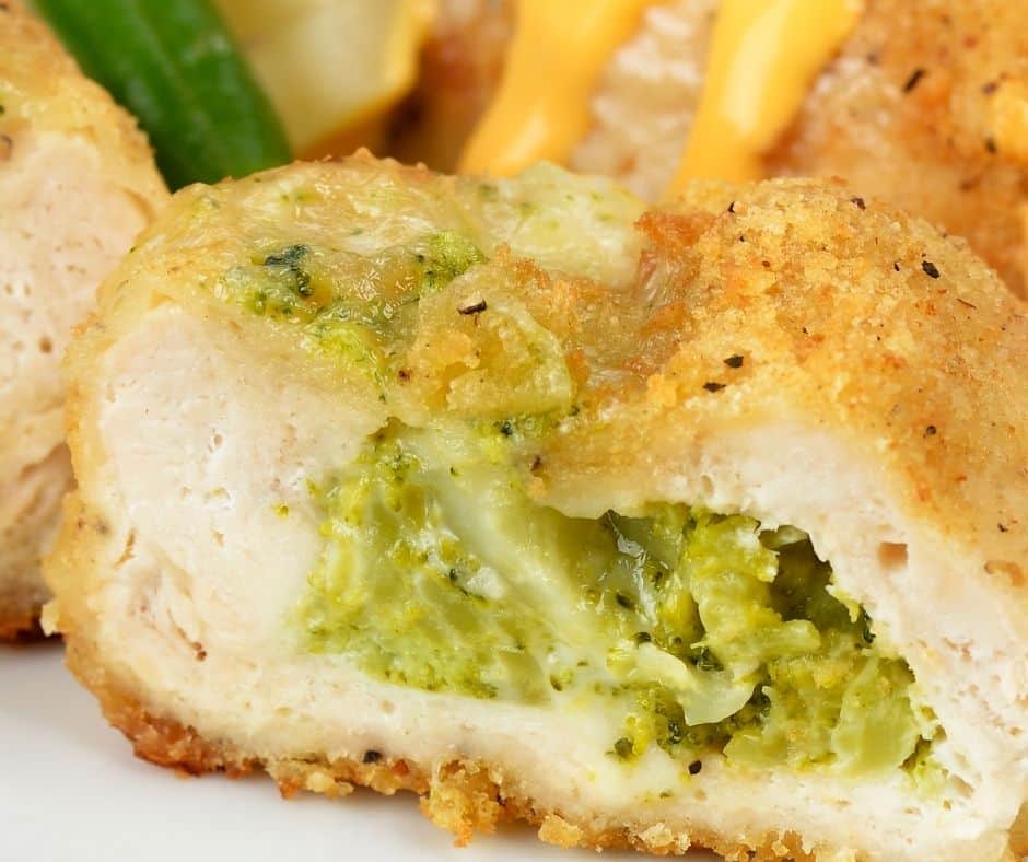 A close-up of a golden-brown stuffed chicken breast cooked in the air fryer.