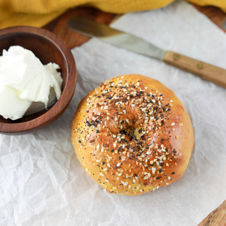 Close-up of a golden everything bagel showing crispy sesame and poppy seed topping made in the air fryer