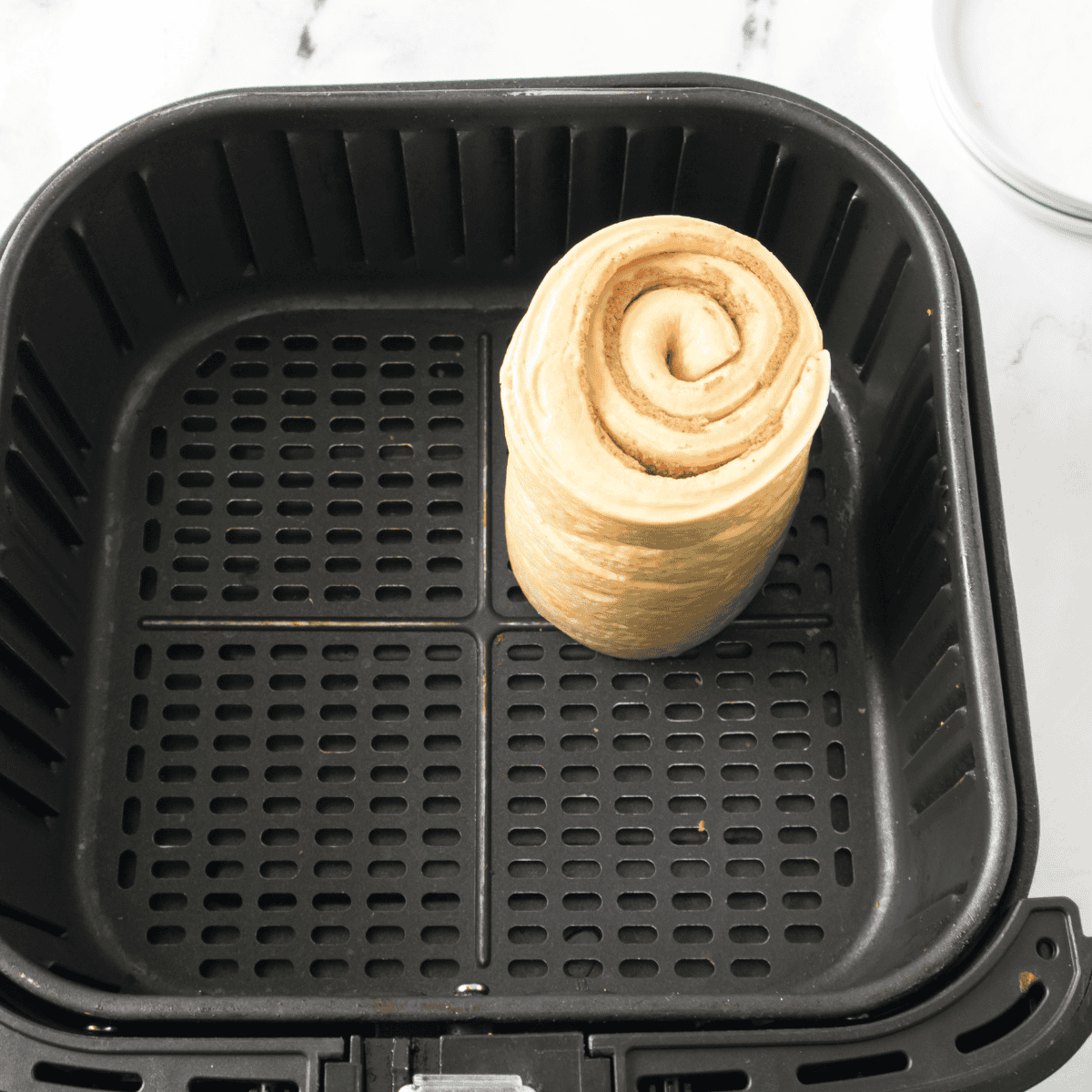 Remove the cinnamon rolls from the package.