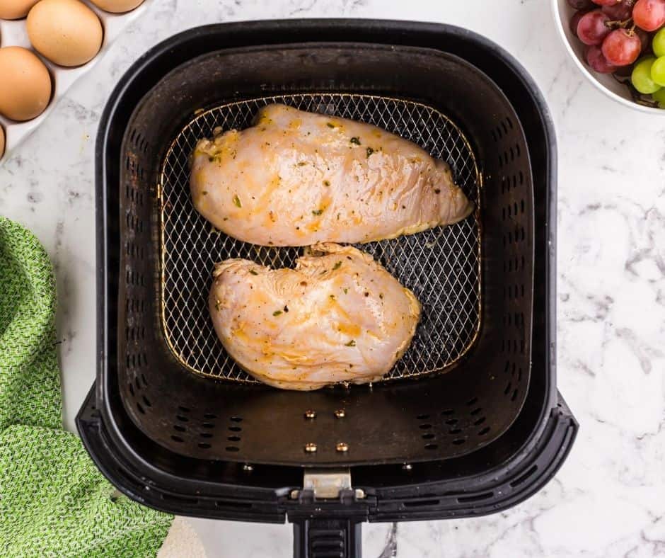 Place chicken into the air fryer basket, until cooked until 165 degrees F.