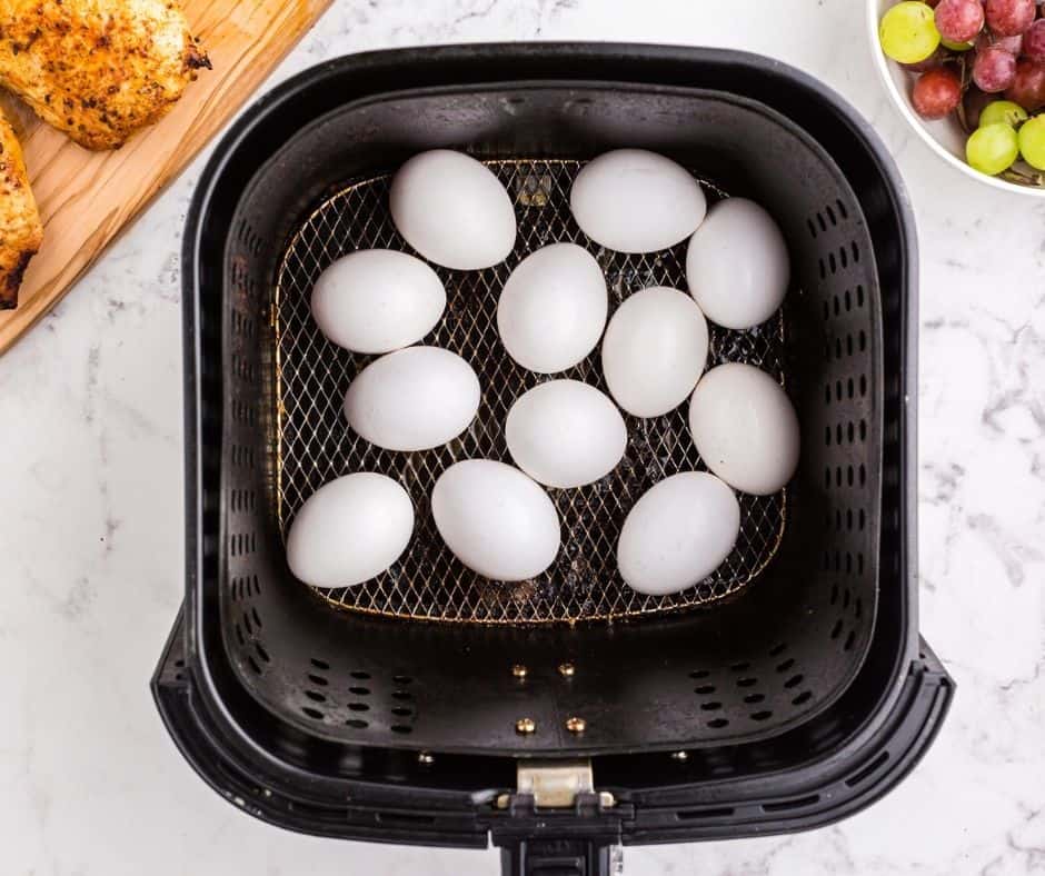 Place eggs into the air fryer basket, cooking until they are the perfect consistency.