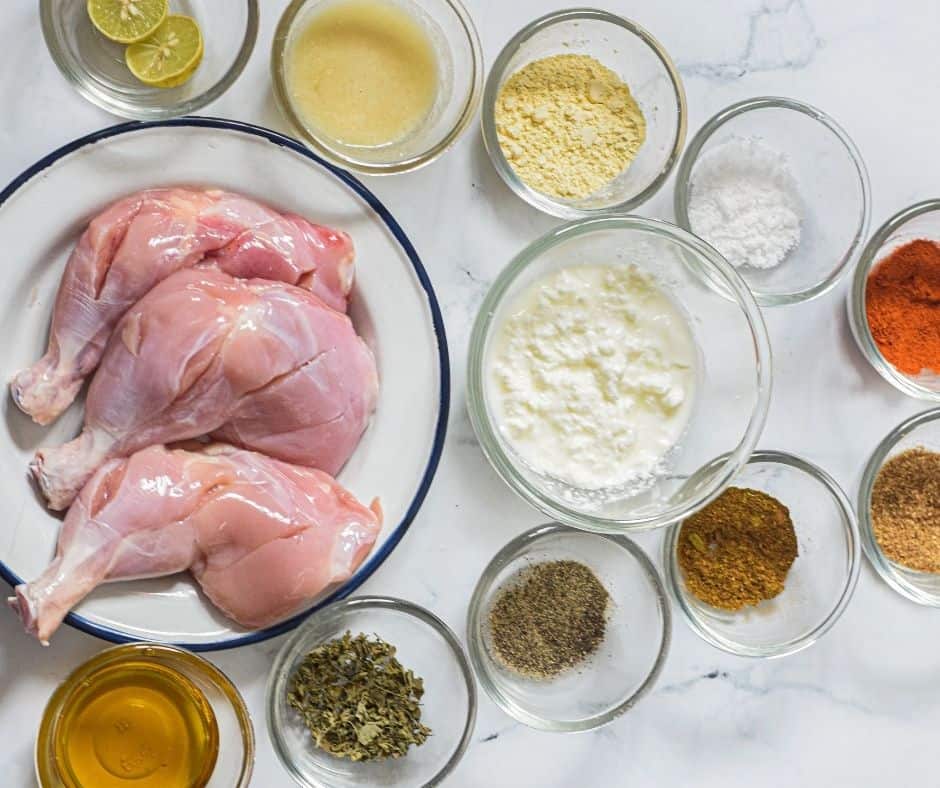 Ingredients Needed For Air Fryer Tandoori Chicken Legs on table.