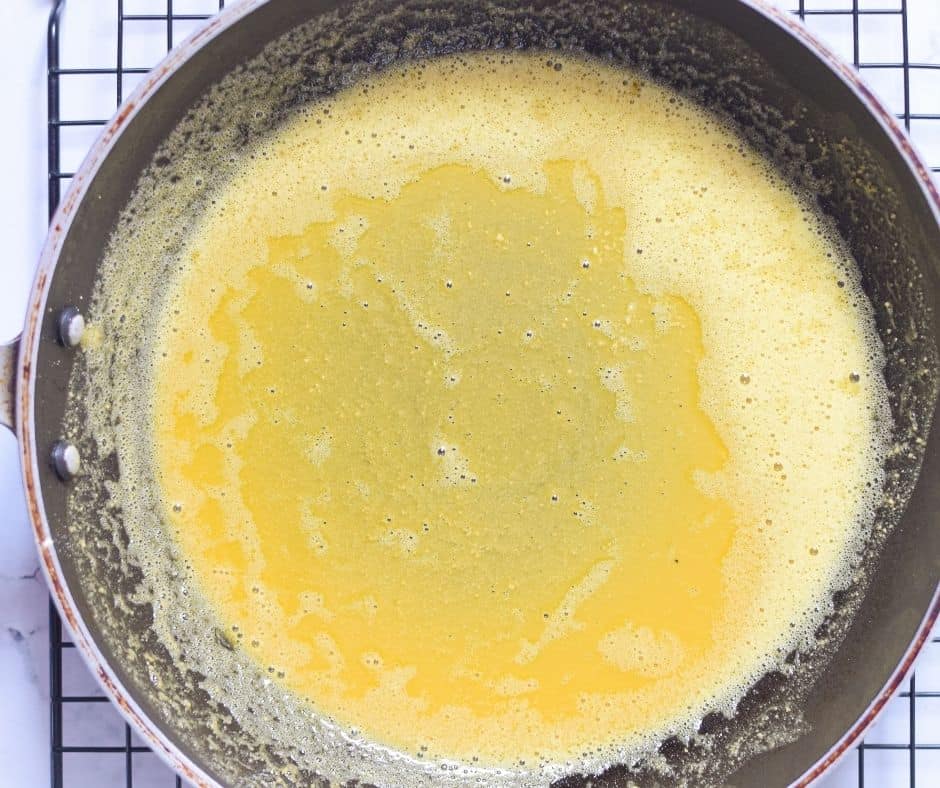 Prepare the sauce in a large skillet or cast-iron pan.