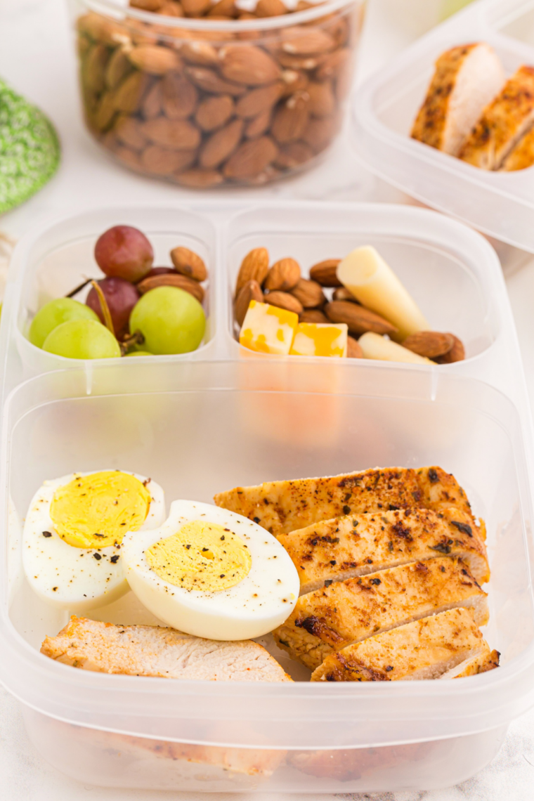 DIY Starbucks Protein Bistro Box with hard-boiled eggs, apple slices, cheese, and peanut butter