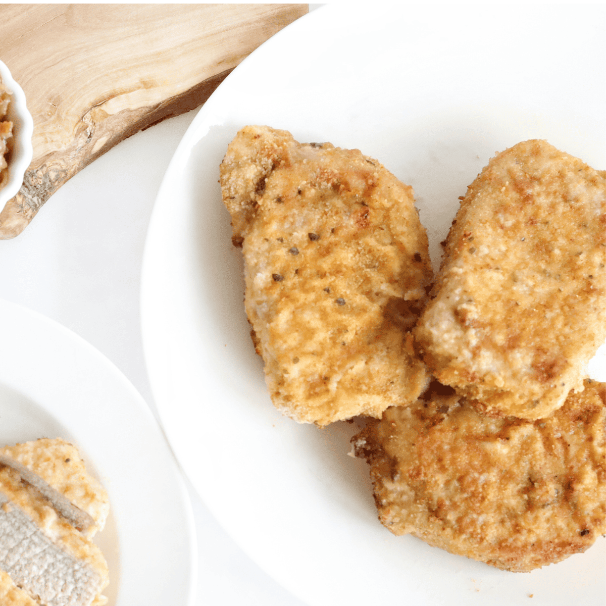 Cracker Barrel Country Fried Pork Chops with crispy breading and creamy gravy.