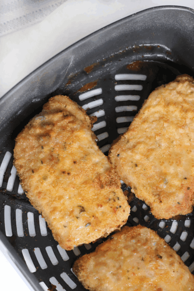 Cracker Barrel Country Fried Pork Chops with crispy breading and creamy gravy.