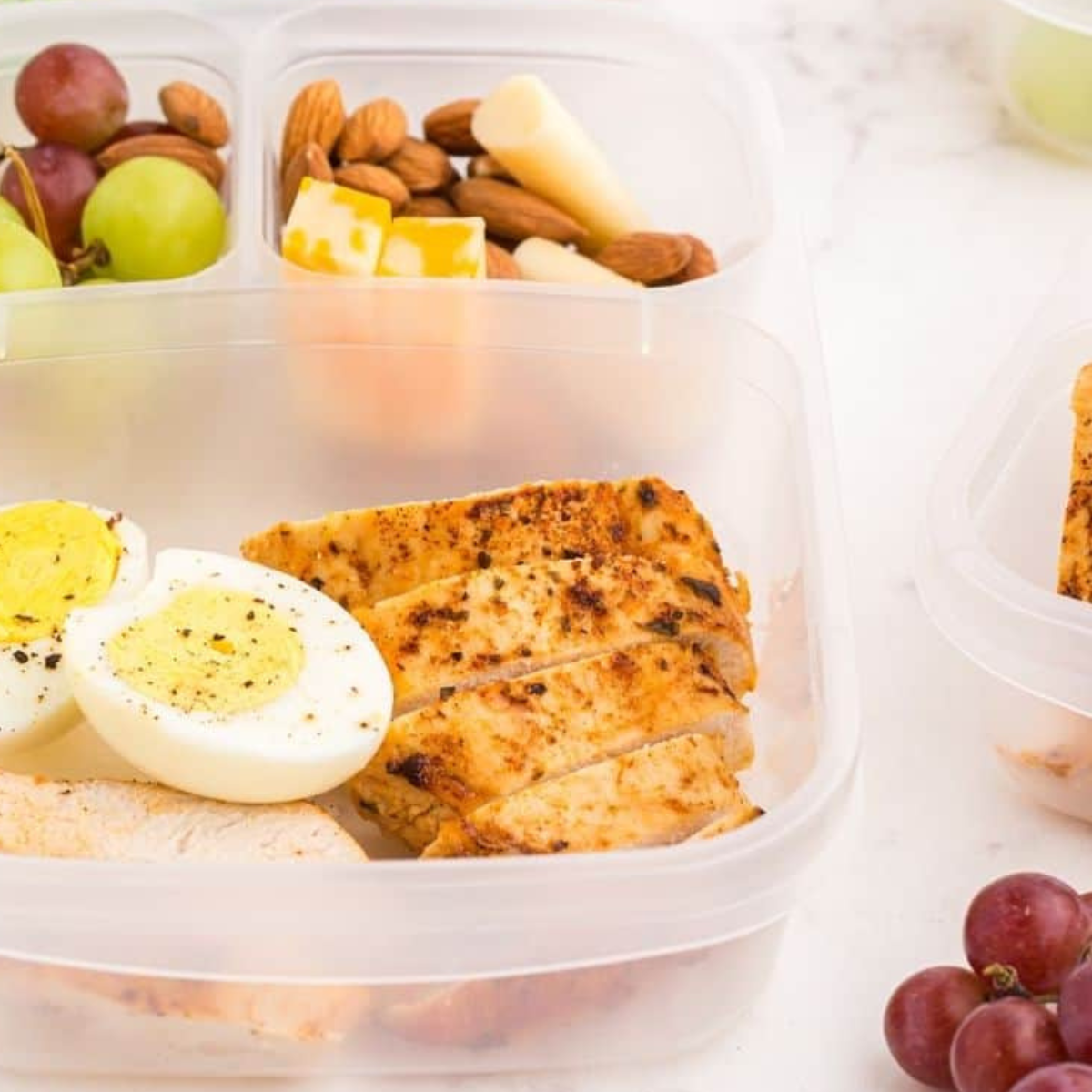 DIY Starbucks Protein Bistro Box with hard-boiled eggs, apple slices, cheese, and peanut butter