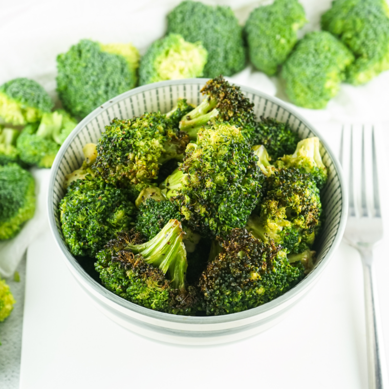 Crispy Ninja Crispi broccoli topped with melted Parmesan and a squeeze of lemon