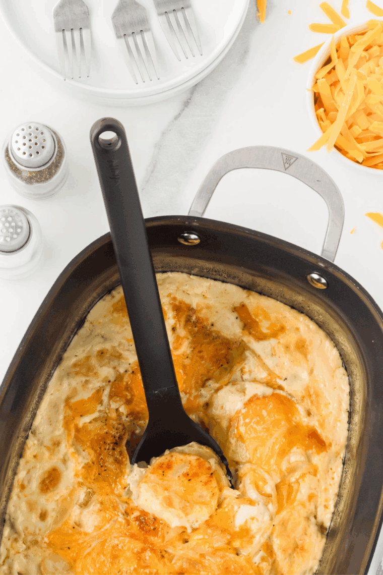 Sprinkling extra Parmesan and broiling for golden crust before serving