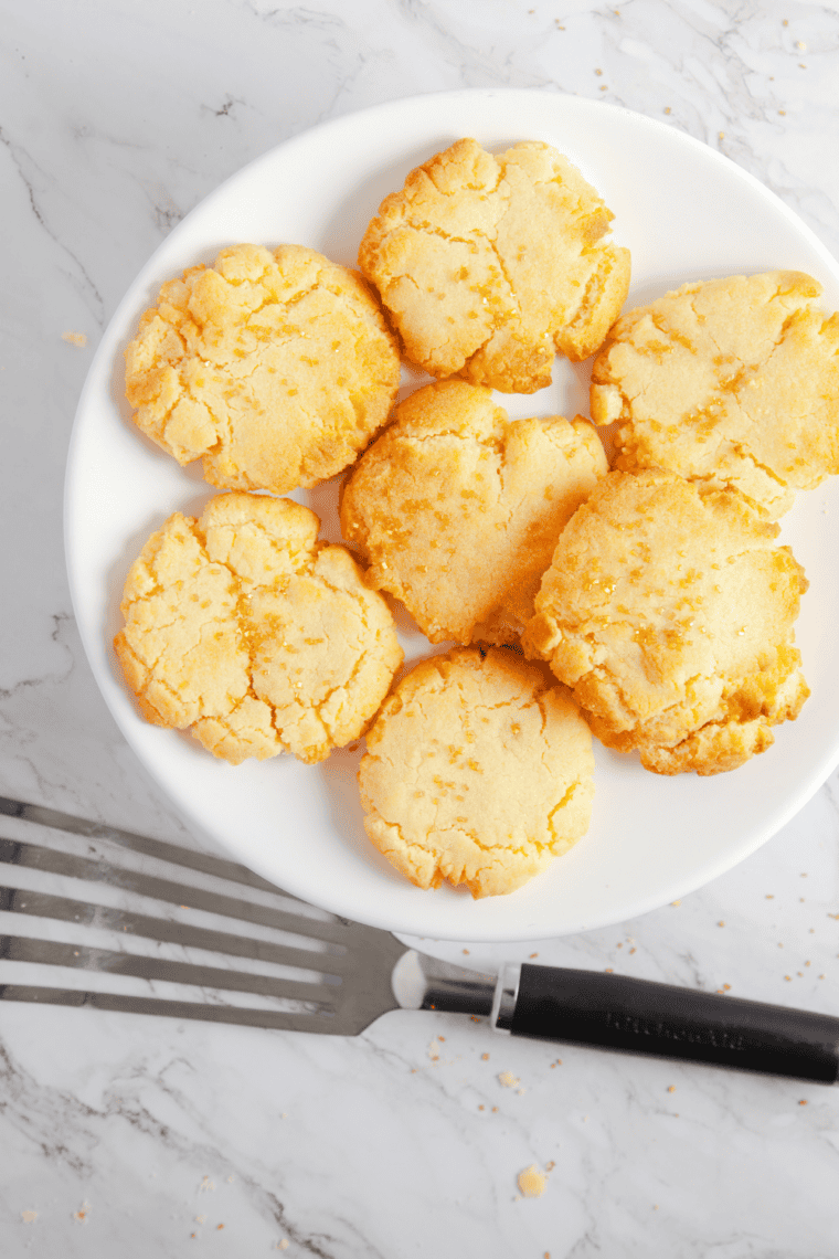 Buttery 3-ingredient shortbread cookies fresh from the air fryer on a plate.