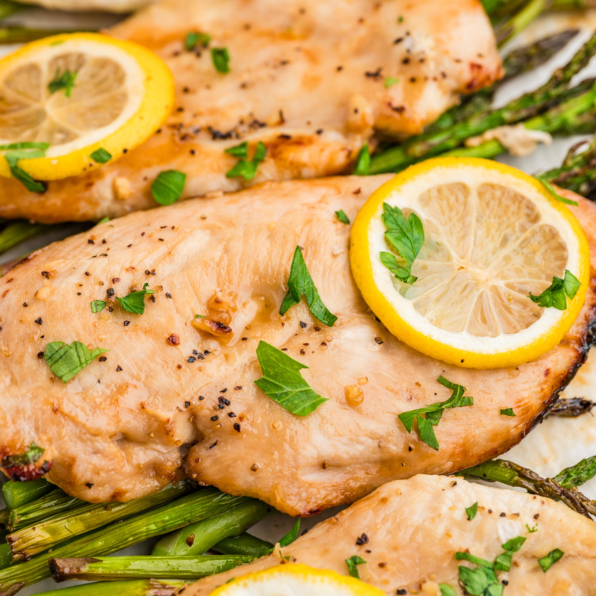 Plate of Air Fryer Chicken and Asparagus, beautifully arranged with vibrant colors.