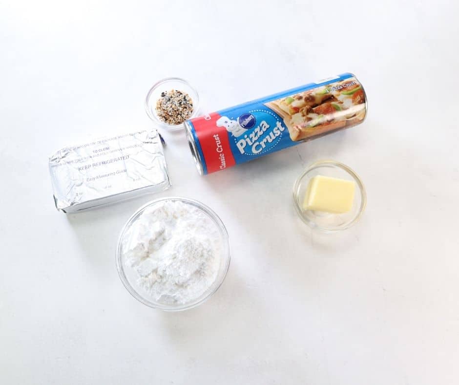 Ingredients Needed For Air Fryer Stuffed Bagel Balls on a white background.
