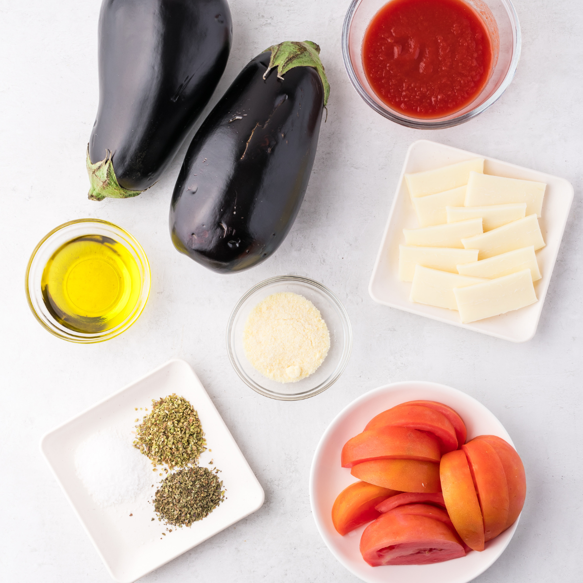 Ingredients needed for Air Fryer Eggplant Rollatini on kitchen table.