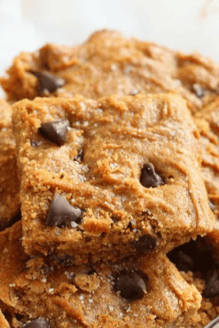 Plate of gluten-free peanut butter blondies cut into squares