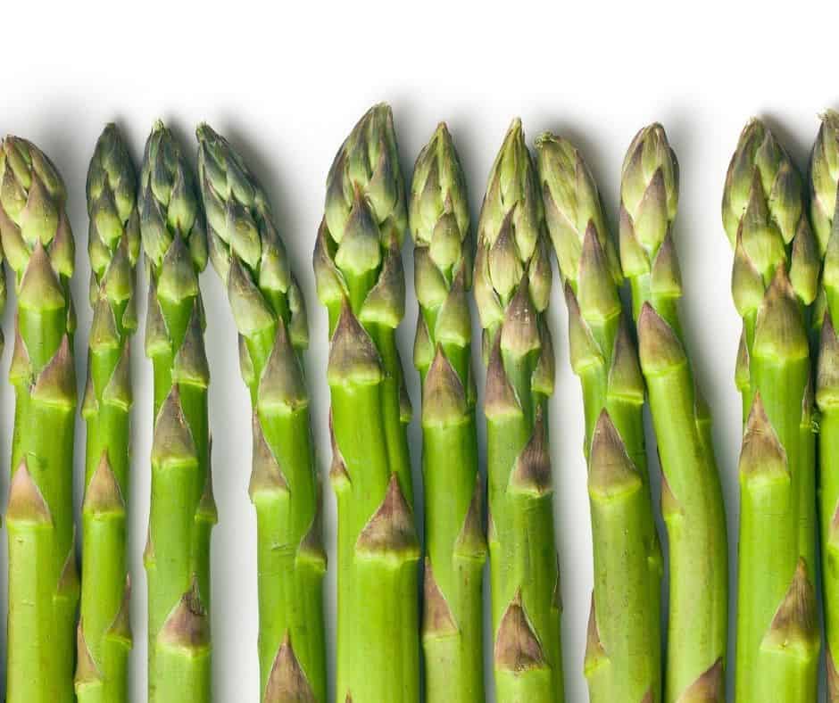 Ingredients needed for Air Fryer Asparagus Quiche on kitchen table.