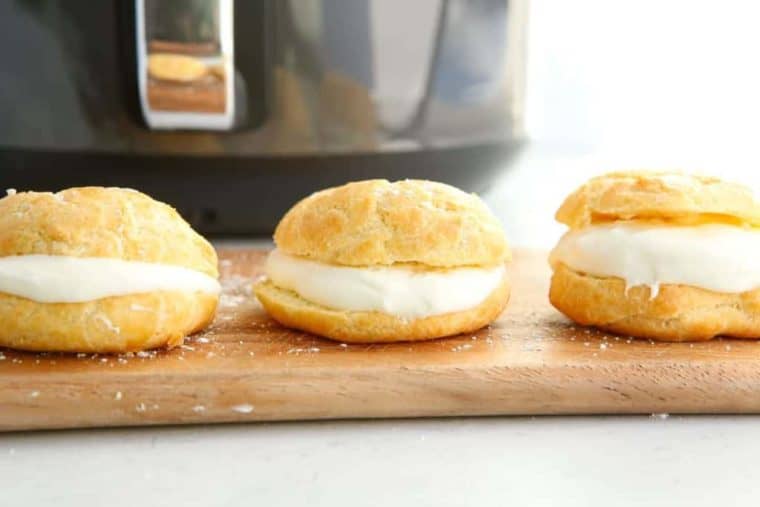 Air fryer cream puffs with a light, golden exterior and homemade whipped cream filling.