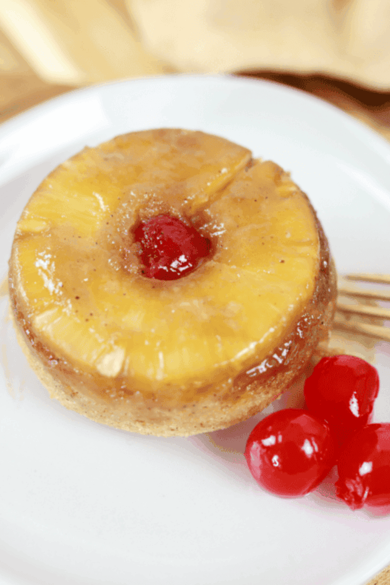 Air fryer pineapple upside-down cake for two, featuring caramelized pineapple slices on top.