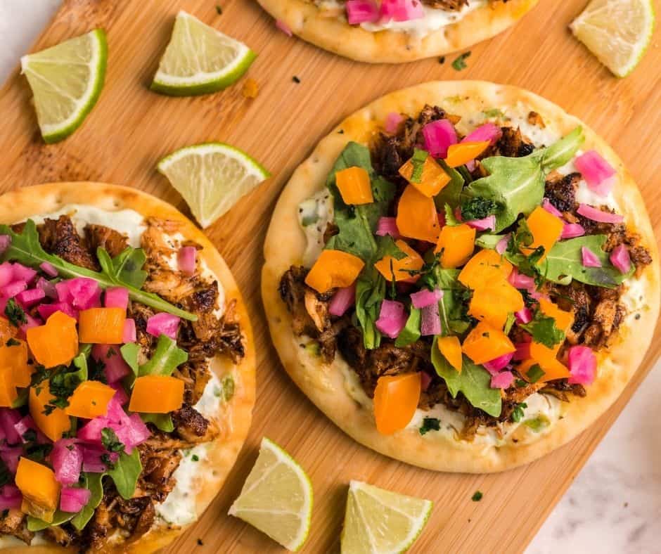 Air Fryer Salmon Tacos with crispy salmon, fresh toppings, and a tangy sauce served in soft tortillas for a tasty meal.