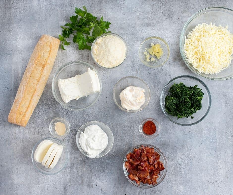 Ingredients Needed For Air Fryer Cheesy Bacon Spinach Dip on table.