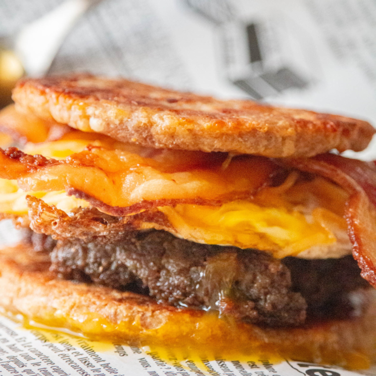 "Air Fryer Copycat Sausage McGriddle with pancakes, sausage patty, and melted cheese"