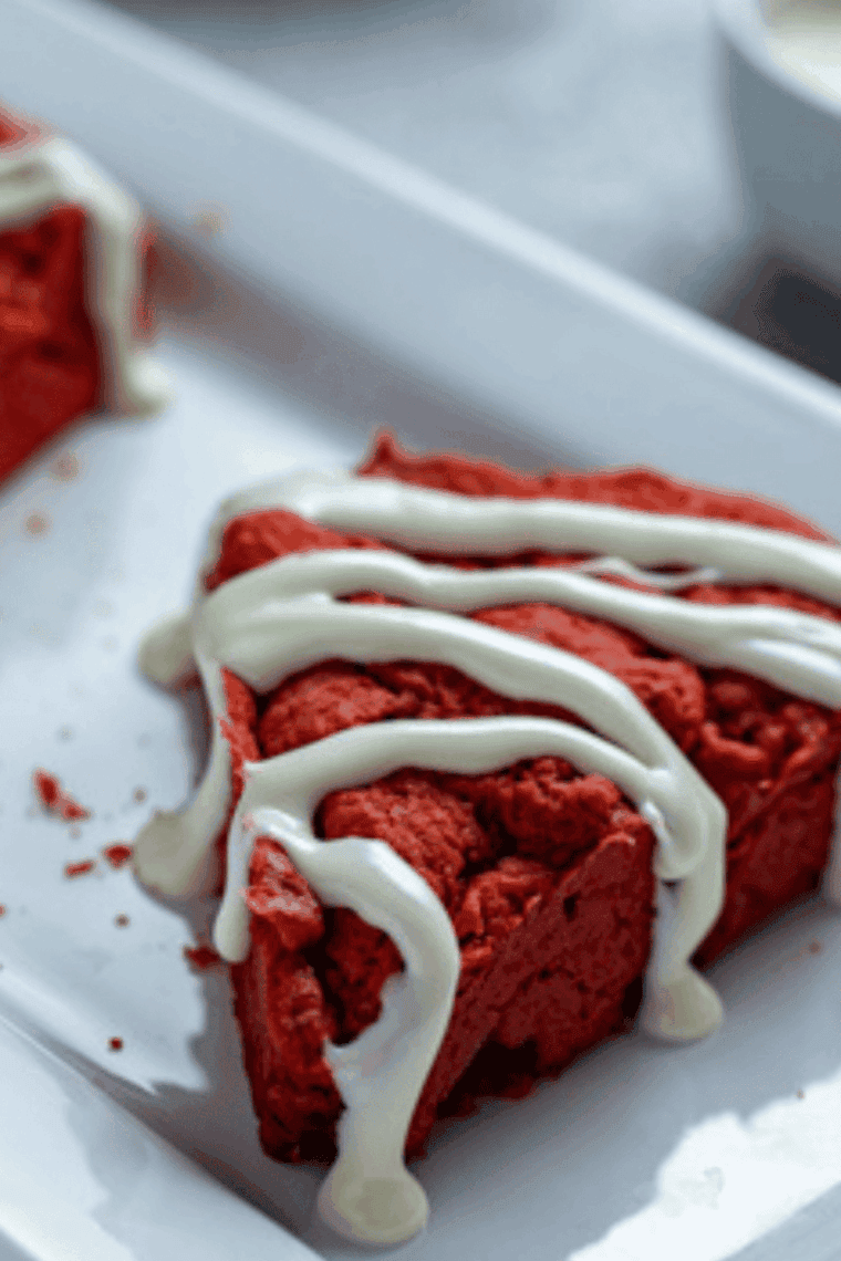 Freshly baked Air Fryer Red Velvet Scones with a golden crust and soft, chocolatey interior, served on a plate ready to enjoy.