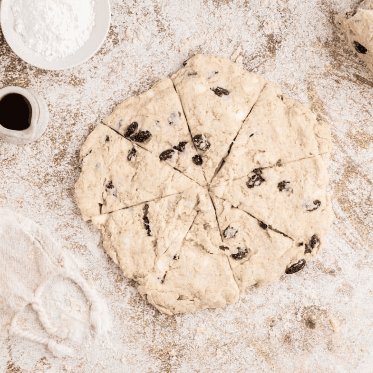 Add buttermilk to form a rough dough, then gently fold in raisins until evenly distributed.