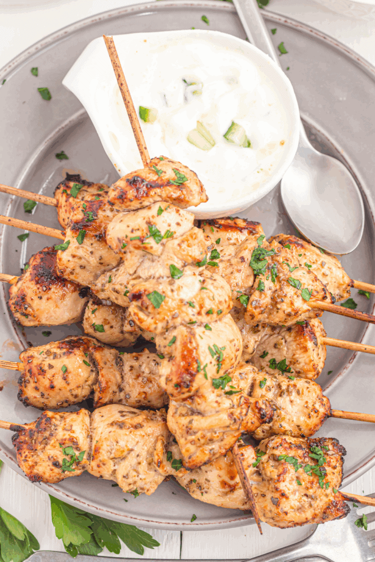 Easy air fryer cilantro lime chicken skewers cooked until juicy and lightly charred on wooden skewers