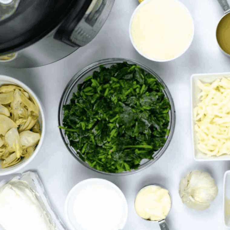 Ingredients needed for Instant Pot Copycat Applebee’s Spinach and Artichoke Dip on kitchen table.